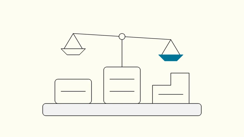 Three differently shaped platform blocks on one base, with a balance scale above them and one pan highlighted.